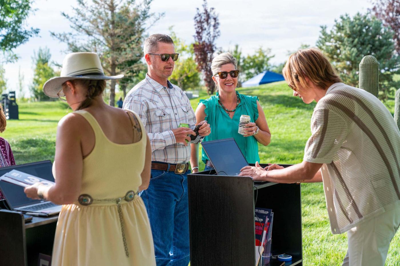 A couple checking into registration