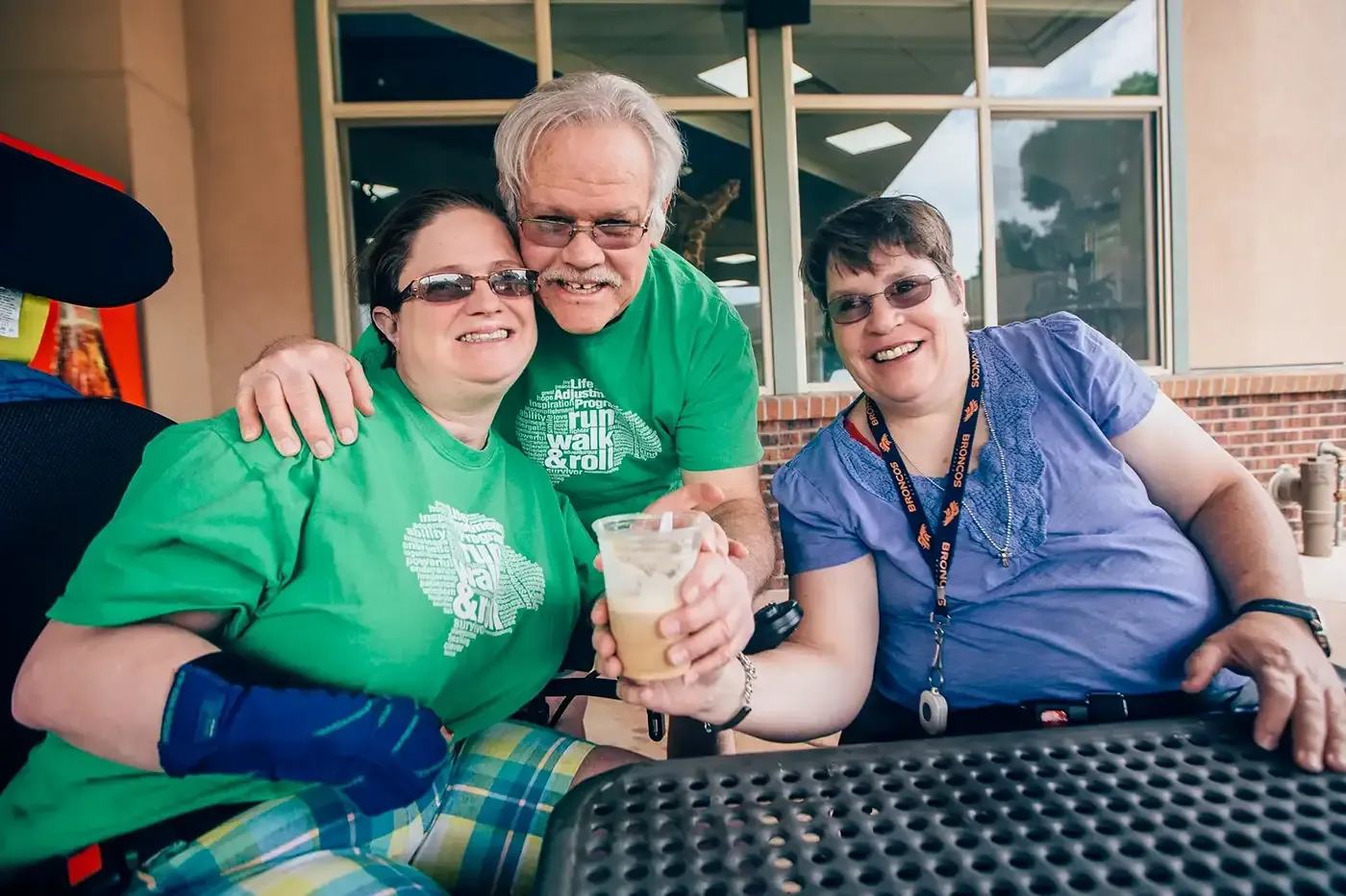 Adults in Hilltop’s Brain Injury Services program enjoying time together outdoors, reflecting the Life Adjustment Program’s supportive community where residents build connections, engage in meaningful activities, and receive individualized care.